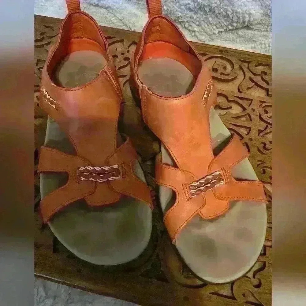 Merrell coral orange leather Flaxen women’s sport sandals US size 7